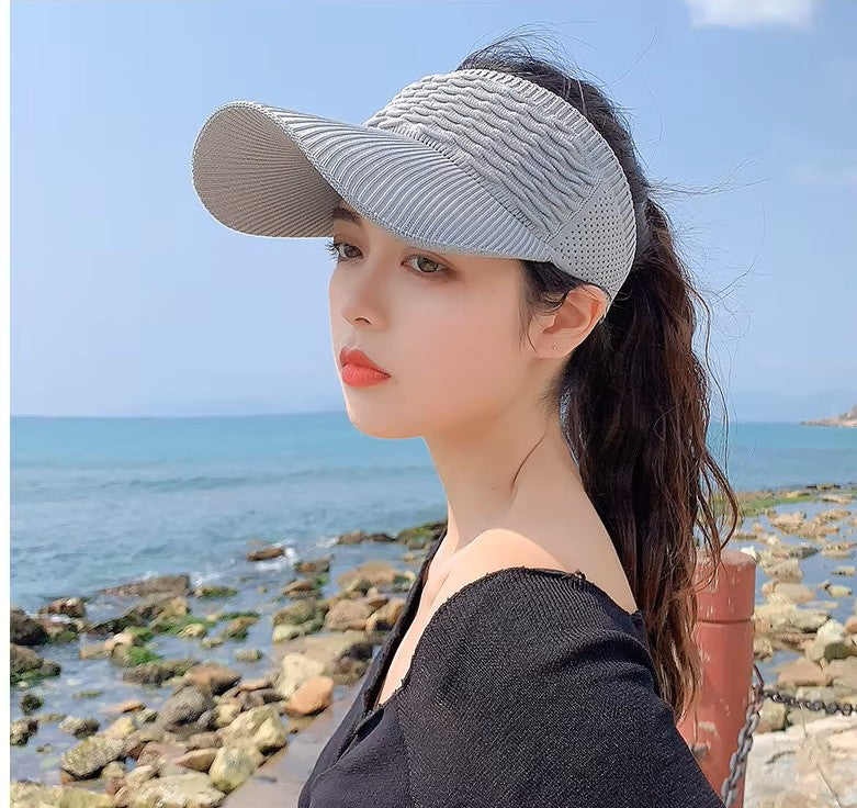 Gorra deportiva UV para mujer, 55-59 cm, ala ancha y transpirable.